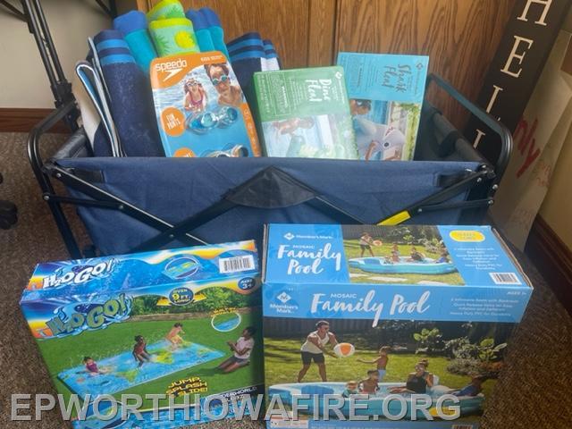 Summer time essentials! Wagon, Swimming Pool Beach Tools and Floating Devices. Donated by: Briley Dog Grooming, Daycare and Boarding Briget Featherston