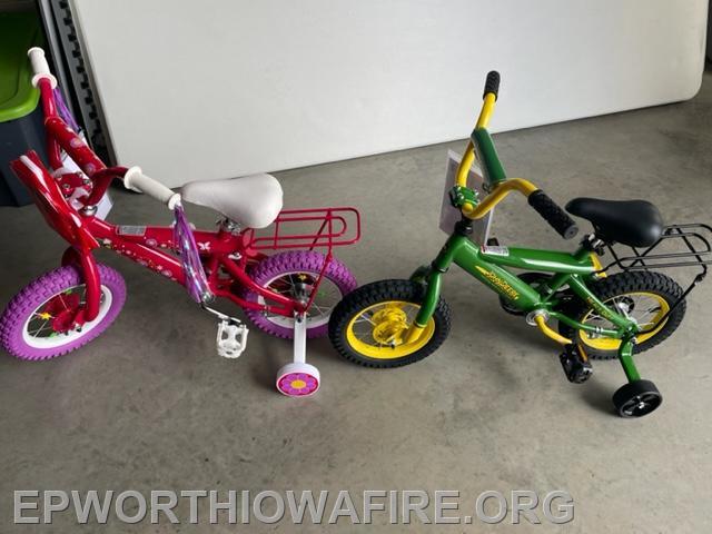 2 John Deere Kids Bikes donated by Jerry and Sue Ostwinkle