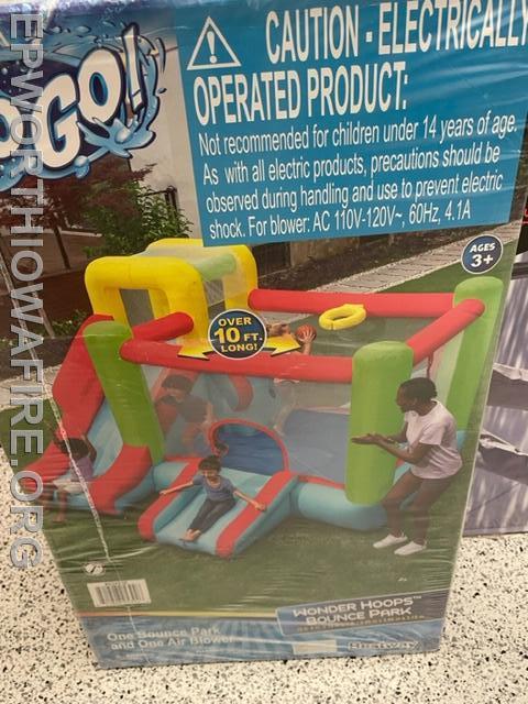 Inflatable Bounce House donated by Austin and Taylor Schmit and Kelsey and Tyler Then